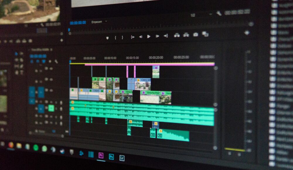 Close-up of a video editing timeline interface on a computer screen, showcasing professional software in action