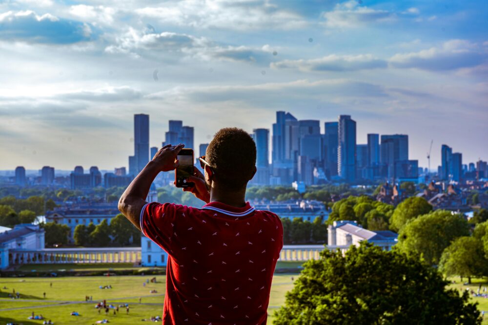A man takes a picture of London