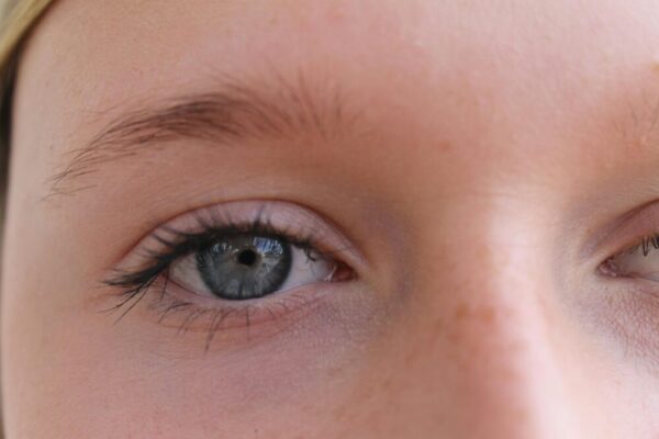 Detailed close-up of a blue eye capturing the intricacies of the iris.