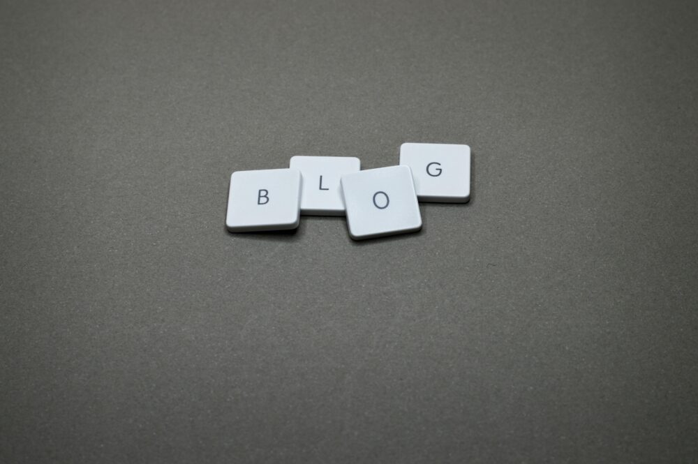 White Scrabble tiles spelling