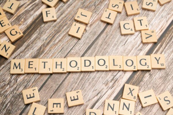 Wooden letter tiles spelling