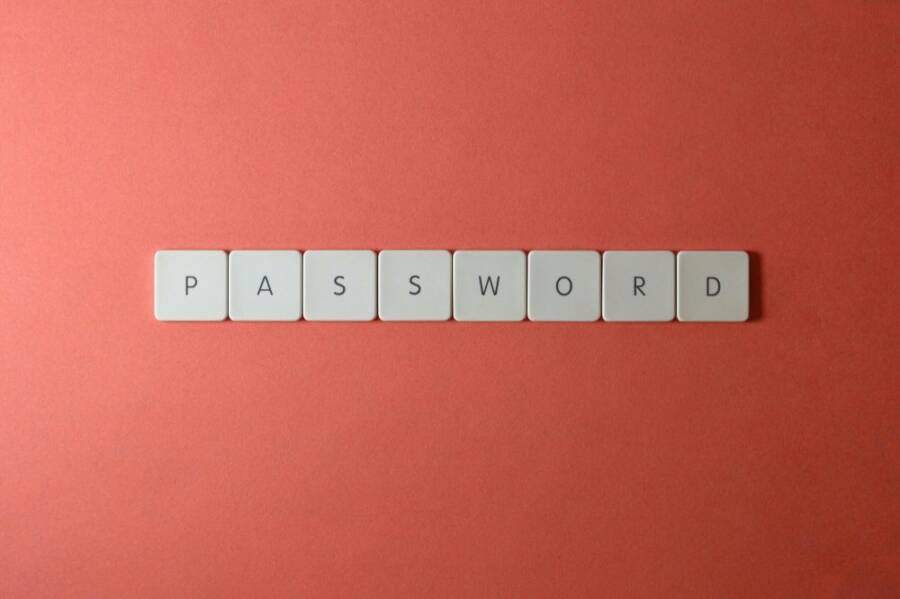 Focus on password security with white keyboard tiles spelling