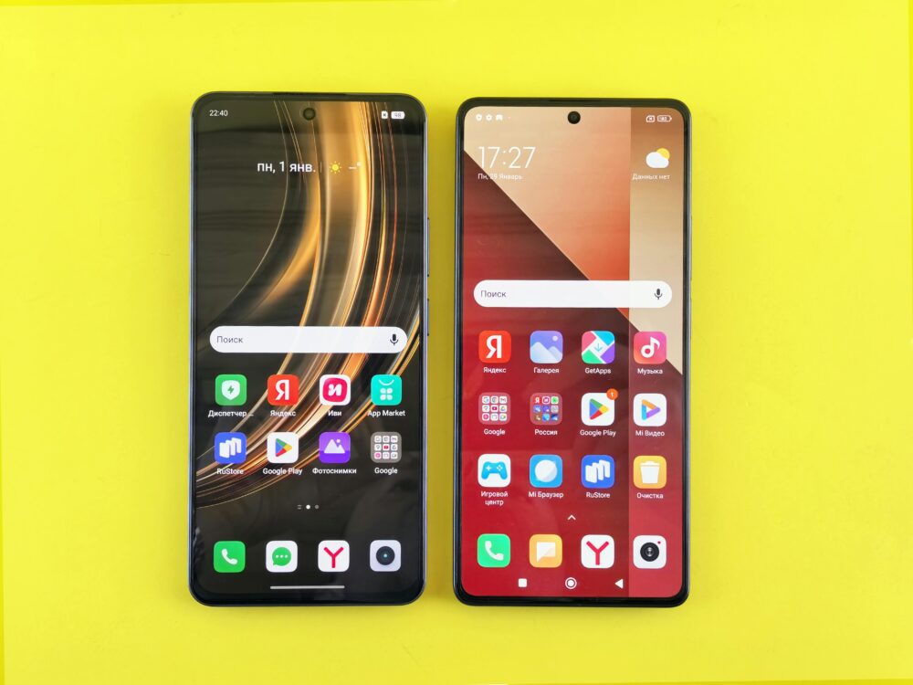 Two modern smartphones displayed side by side on a bright yellow surface. Minimalist technology concept.