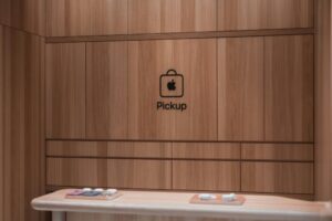 Modern Apple store pickup counter featuring a sleek wooden interior design