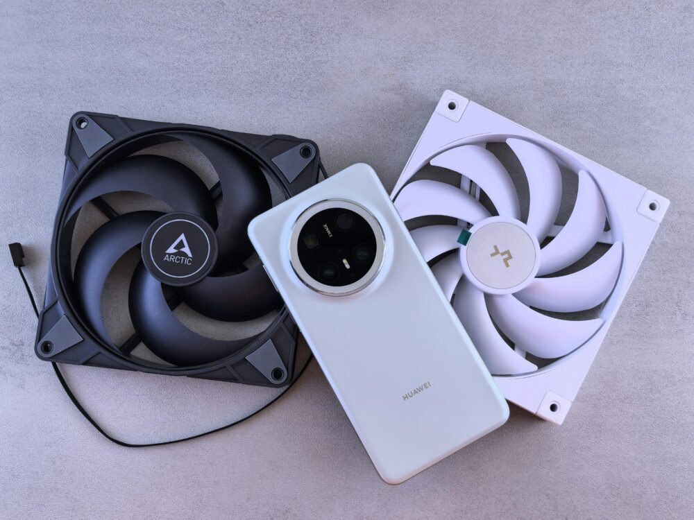 Image of a smartphone with cooling pads and devices on a textured surface