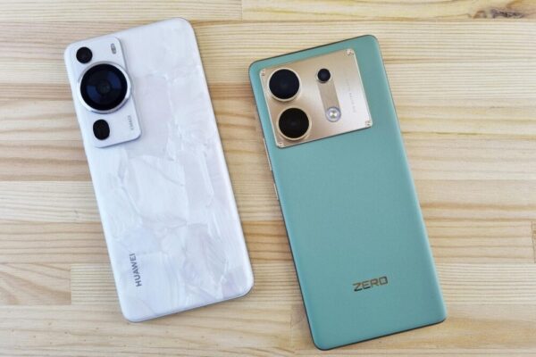 Pixel 9 與 Galaxy S24 對比:演算法與硬體協同在成像與性能上的差異 Close-up of two modern smartphones on a wooden table, contrasting designs and colors.