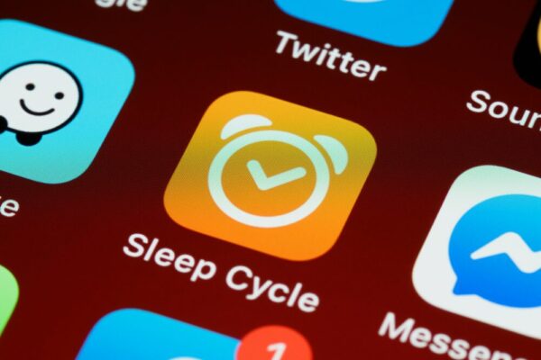 Detailed close-up of Sleep Cycle app icon on smartphone home screen with other applications.
