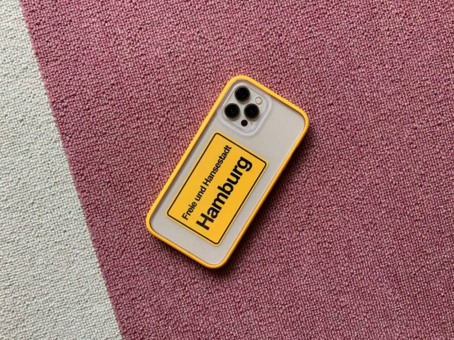 Smartphone with vibrant yellow case displaying