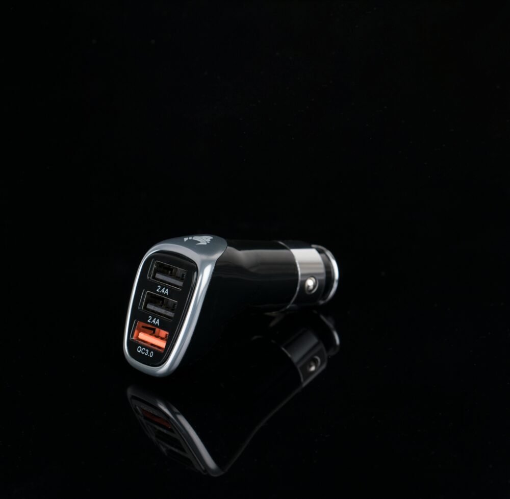 Sleek black car charger featuring multiple USB ports for versatile device charging
