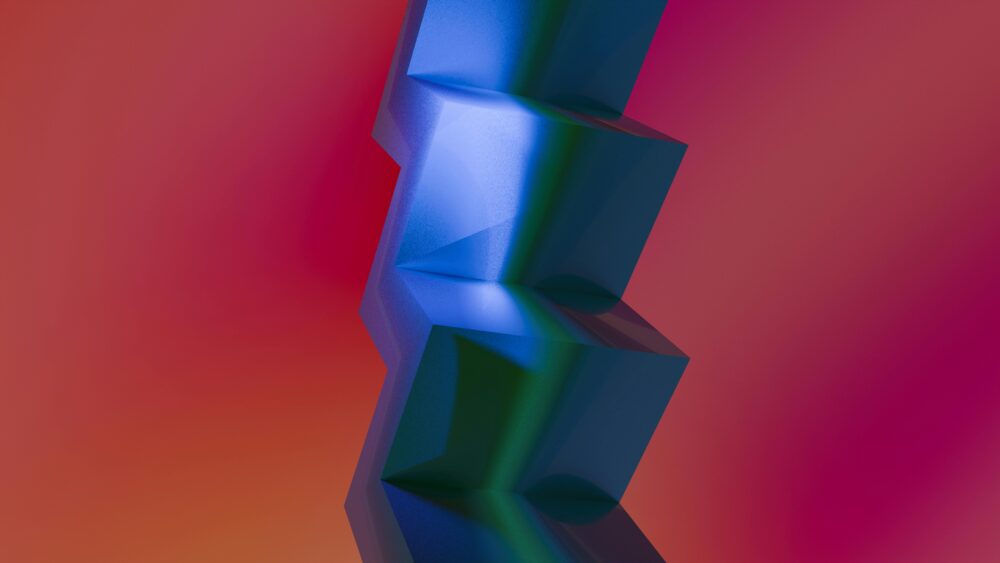 色彩繽紛的抽象3D藝術,以漸變背景上的藍色幾何立方體為特色。