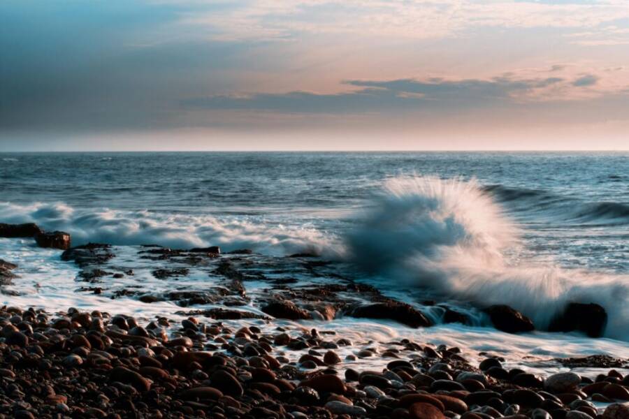 Scenic seascape capturing crashing waves on a rocky beach in Hualien, Taiwan.
