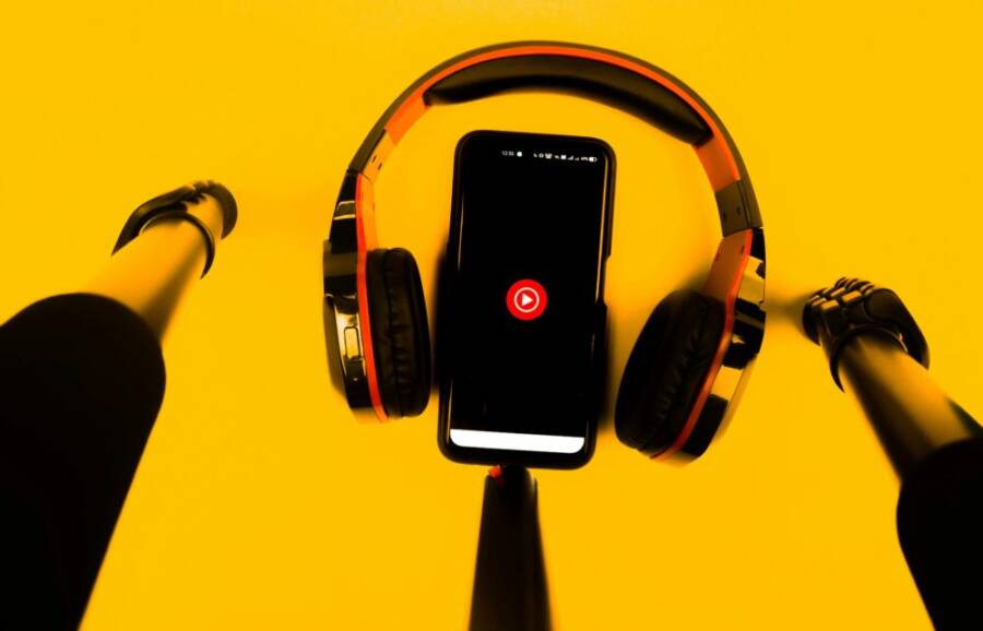 A smartphone with a neatly arranged storyboard on a desk