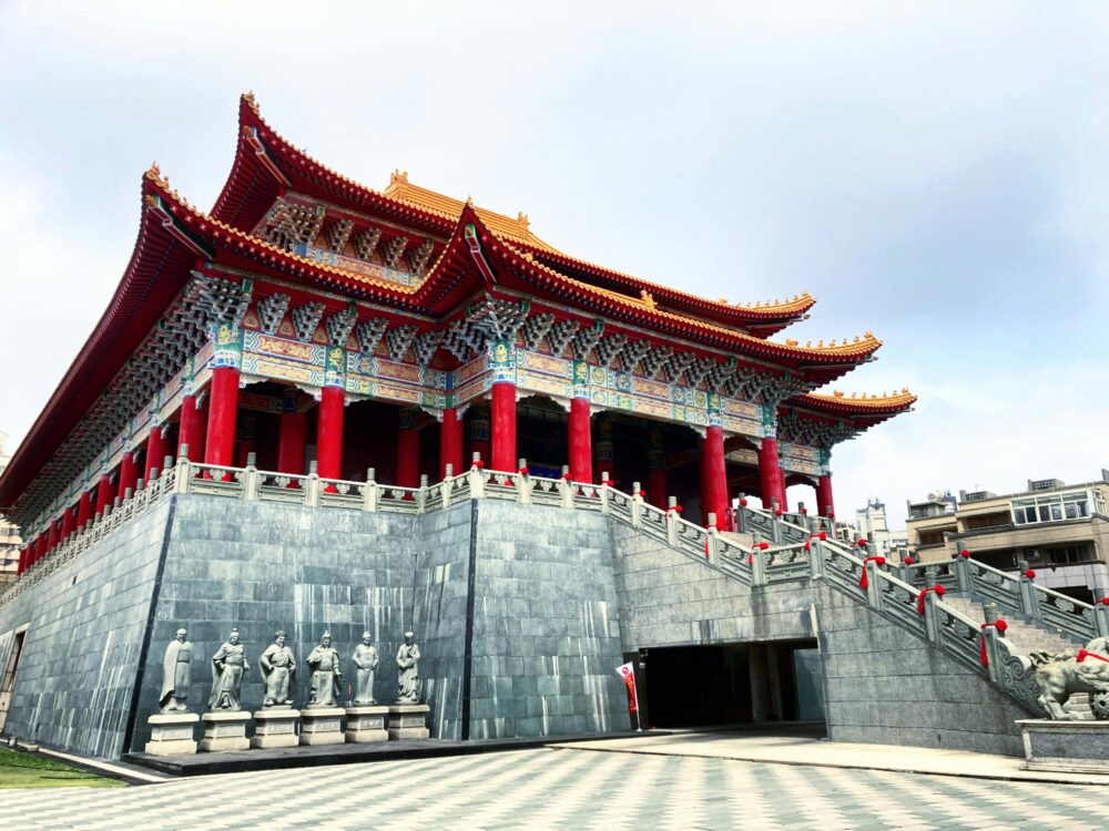 A majestic traditional Chinese temple with intricate architecture and vibrant colors in Taiwan.