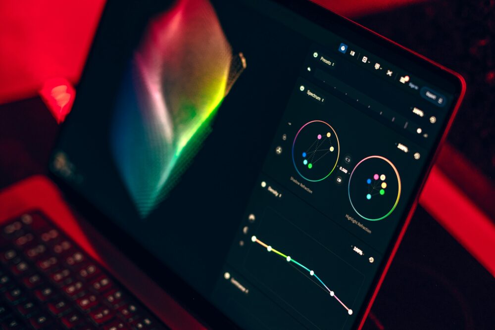 A color grading dashboard on a laptop with vibrant colors