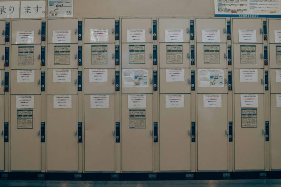 A row of lockers with notices in a Japanese school corridor in Nagoya