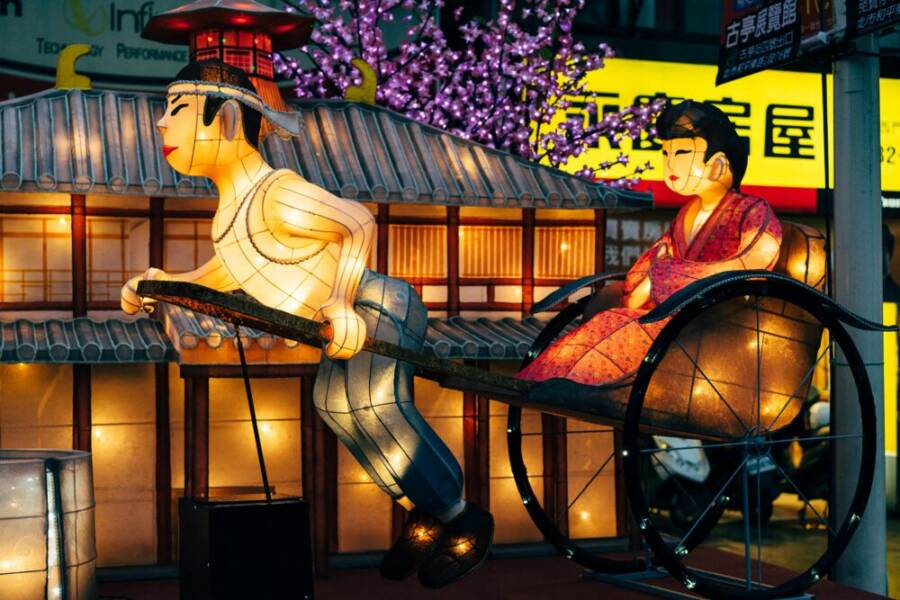 Vibrant illuminated rickshaw lanterns at Taiwan festival