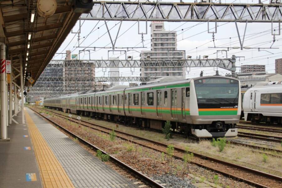 Train at Utsunomiya Station, Japan, showcasing urban transportation and travel.