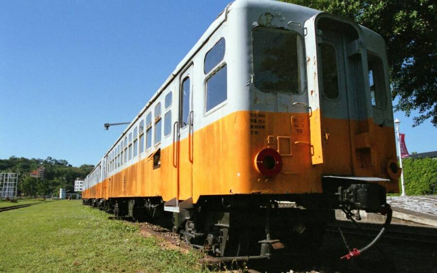 An old orange and gray railway train in Hualien, Taiwan