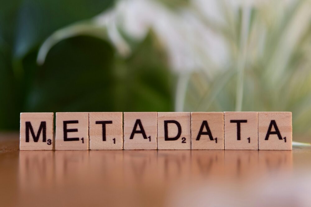Close-up of metadata Scrabble tiles on a table