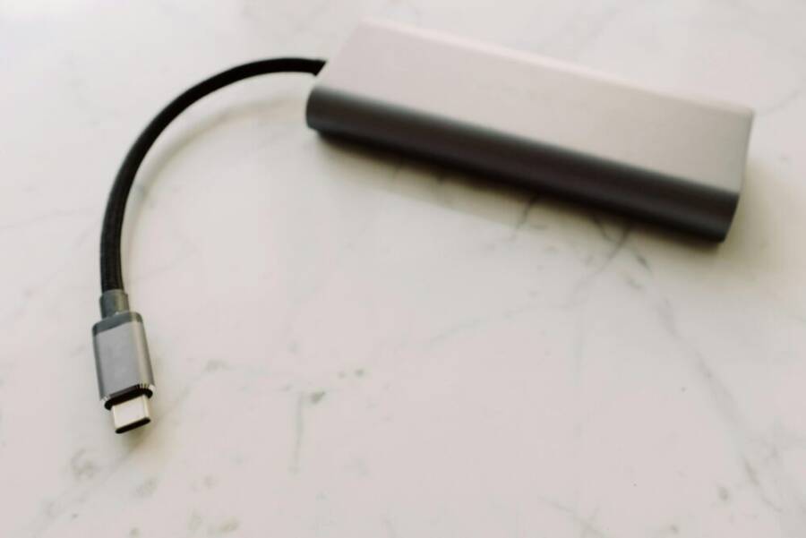 Close-up of a USB-C adapter on a marble surface