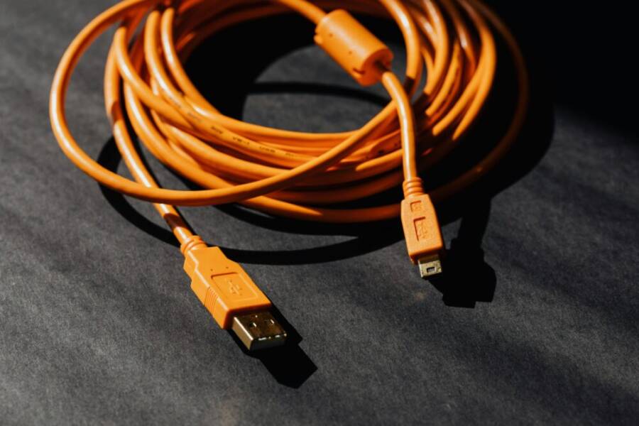 image of a USB cable connecting a phone to a computer
