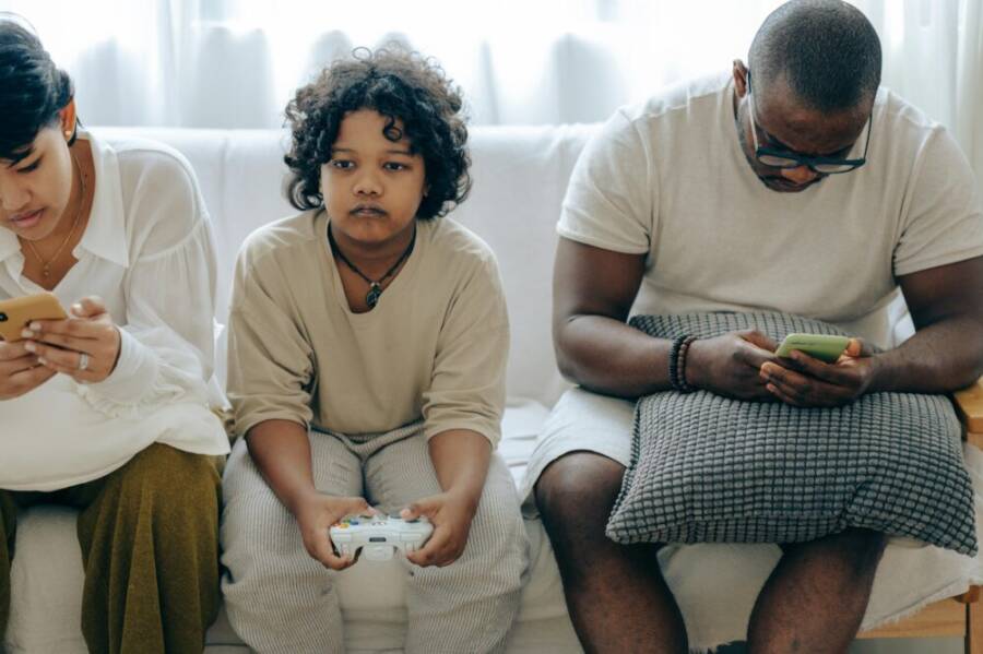 image of a family or devices in a home setting