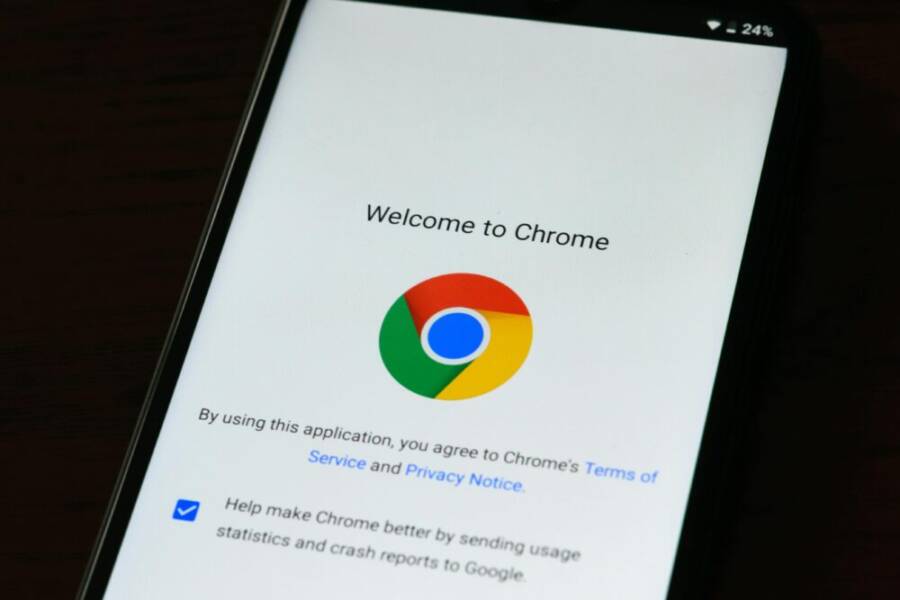 Close-up of smartphone displaying Google Chrome