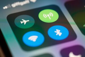 Detailed close-up of a smartphone screen displaying network and connectivity icons.