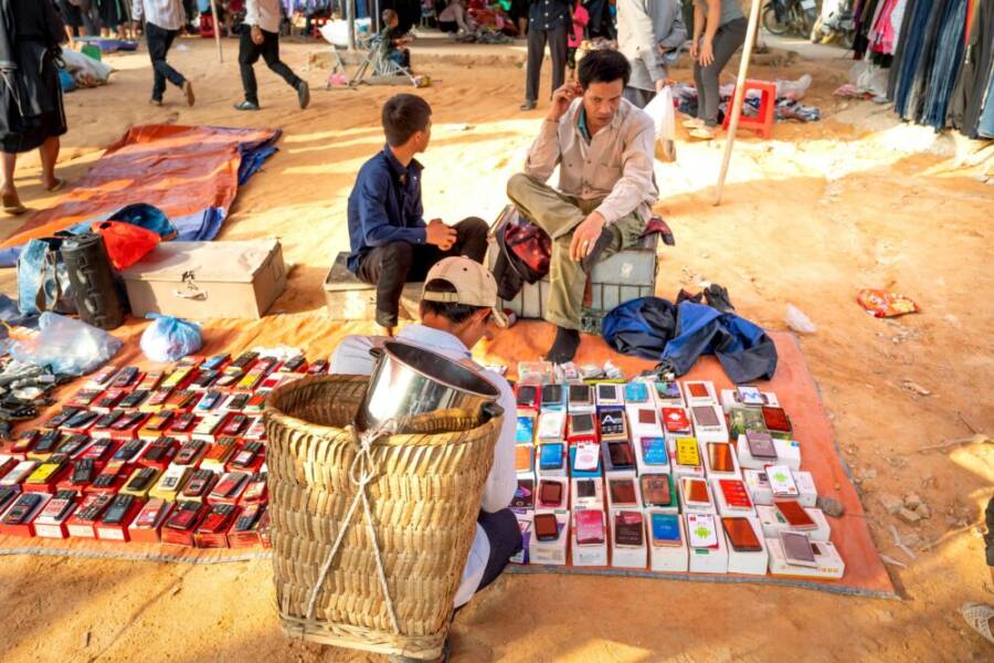 From a bustling phone bazaar with multiple devices on display