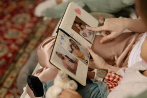 A family enjoying a photo album at home