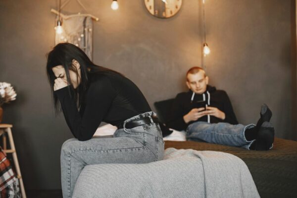 A couple experiencing tension and distance, highlighting relationship challenges