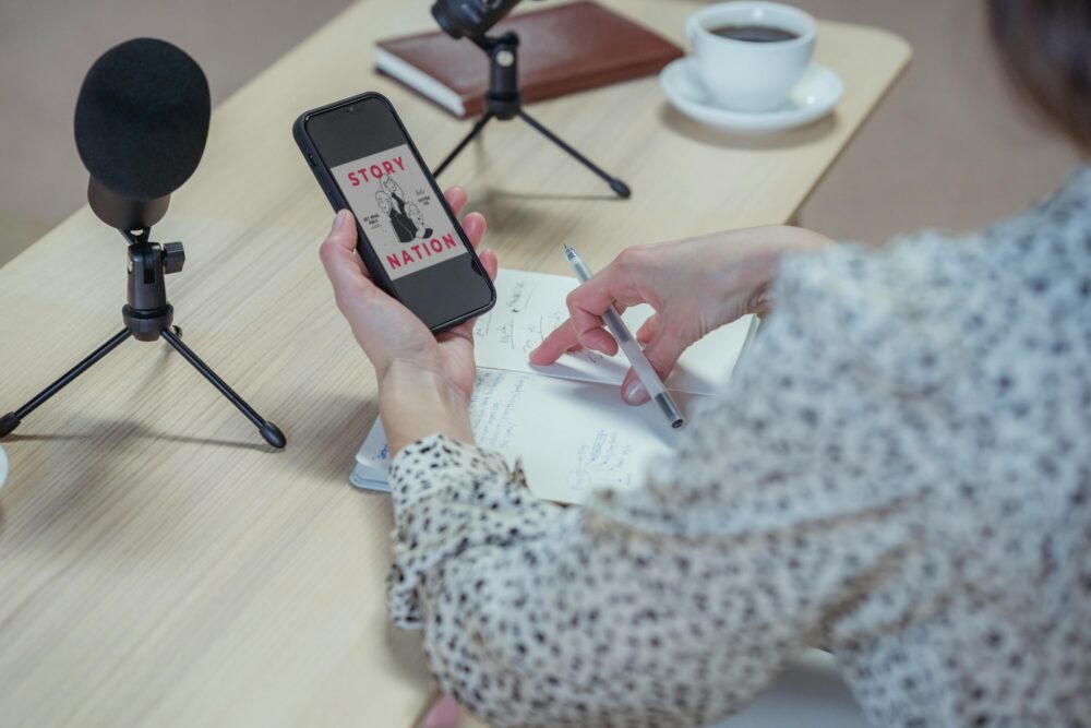 image of a person recording with a smartphone