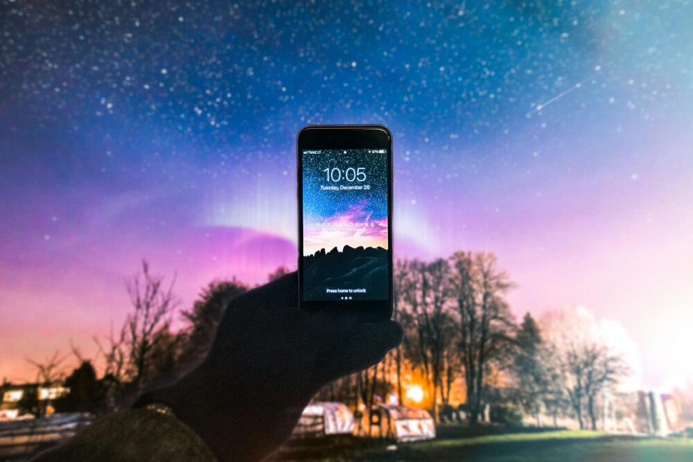 A smartphone displaying the night sky