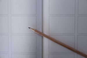 Close-up of a pencil on a storyboard sketch template with blank frames