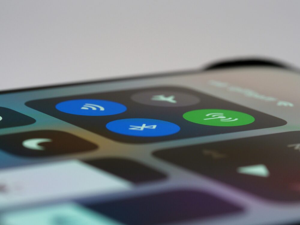 Detailed view of a smartphone control center showing wireless icons, perfect for tech-related topics