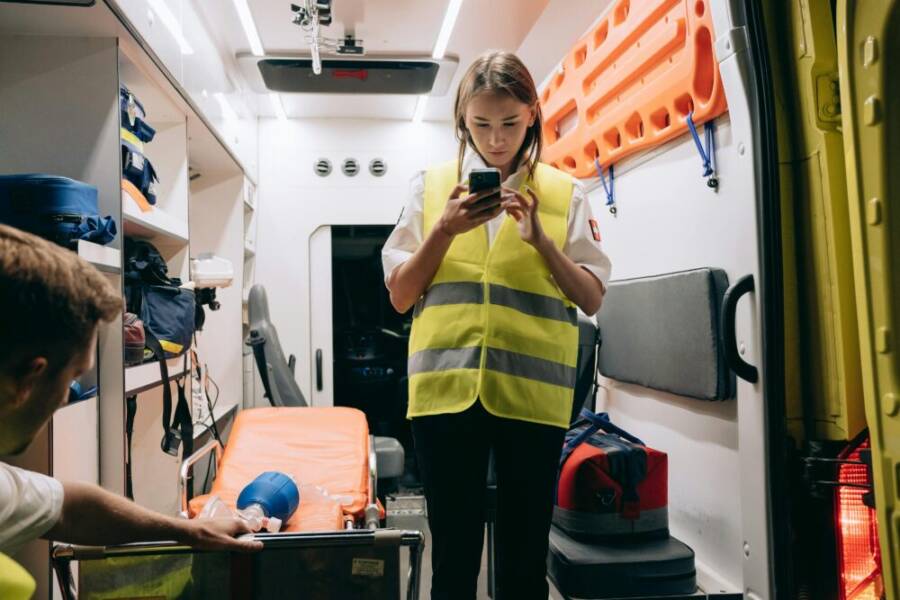Emergency responder using a rugged phone in a vehicle