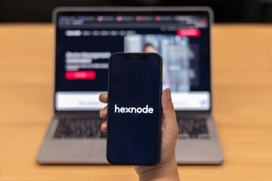 Close-up of a hand holding a smartphone with the app in use