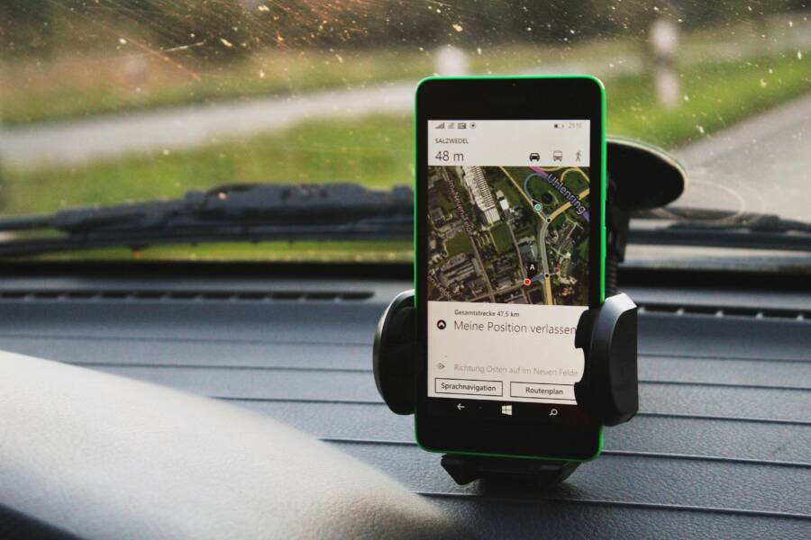 Smartphone navigation mounted on car dashboard