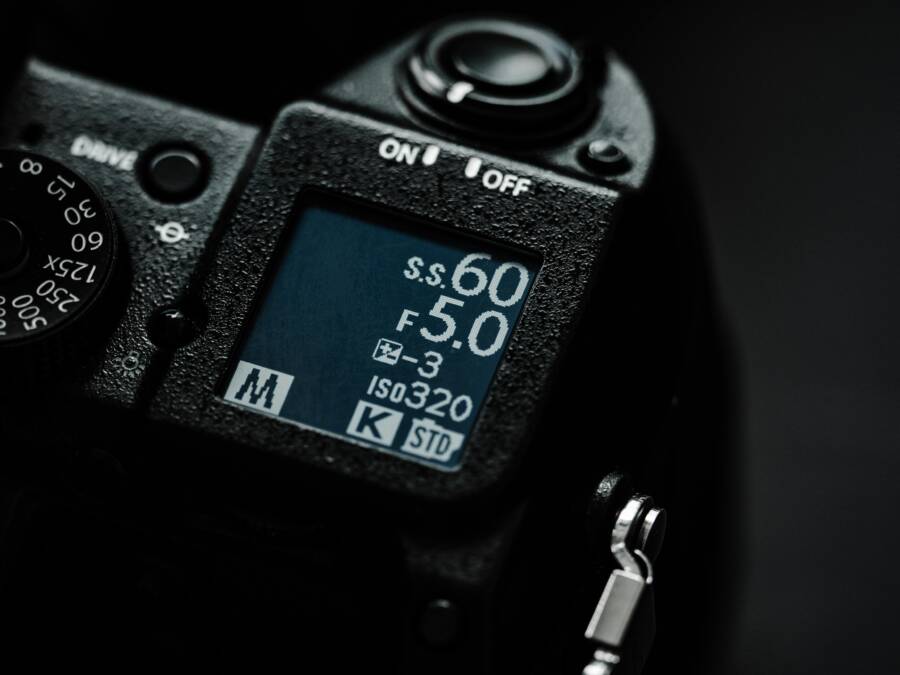 Detailed view of a camera display showing settings like shutter speed and ISO.