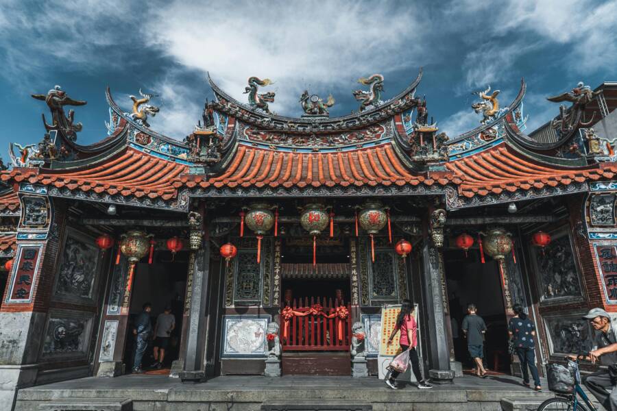 Vibrant Taiwanese temple with ornate architecture and red lanterns in Taichung