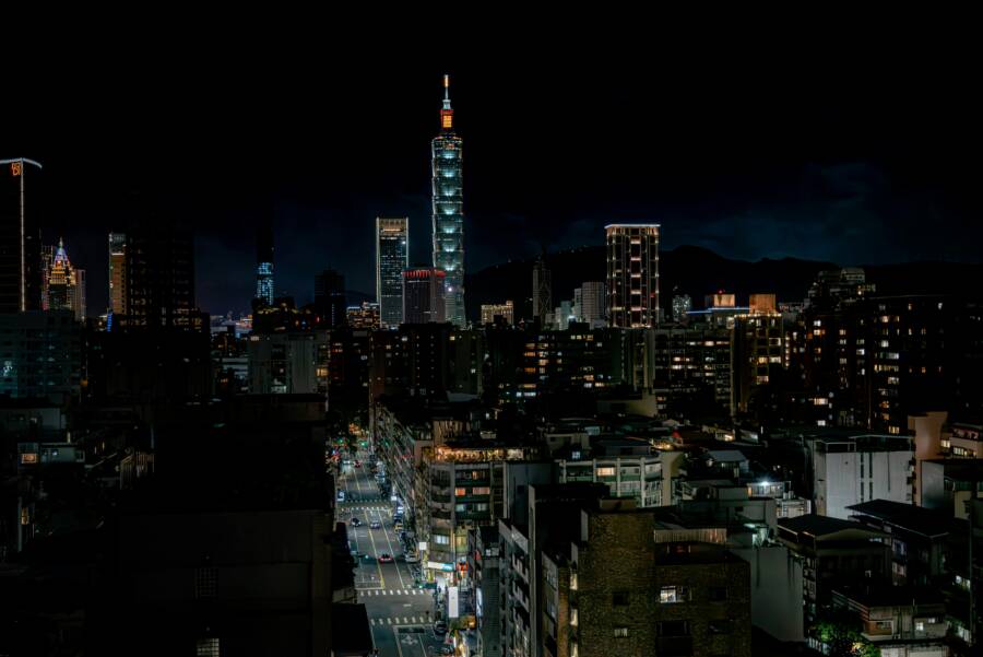 A captivating night view of Taipei cityscape featuring Taipei 101 illuminated against the dark sky.