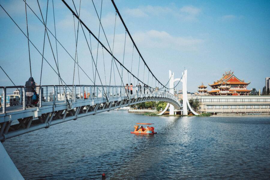 Dramatic view of a suspension bridge and pagoda in Taoyuan City, Taiwan