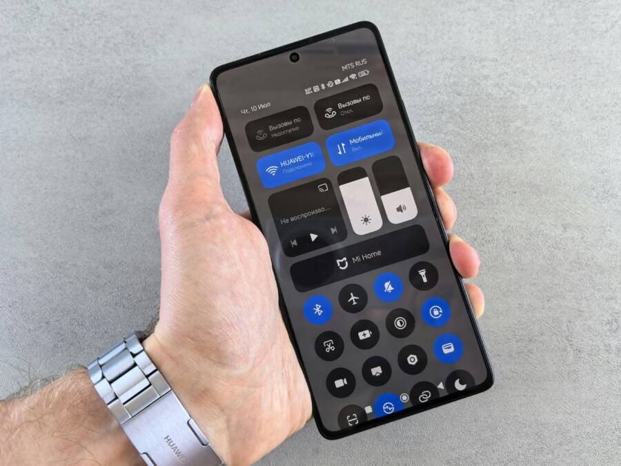 Close-up of a smartphone displaying its control panel interface