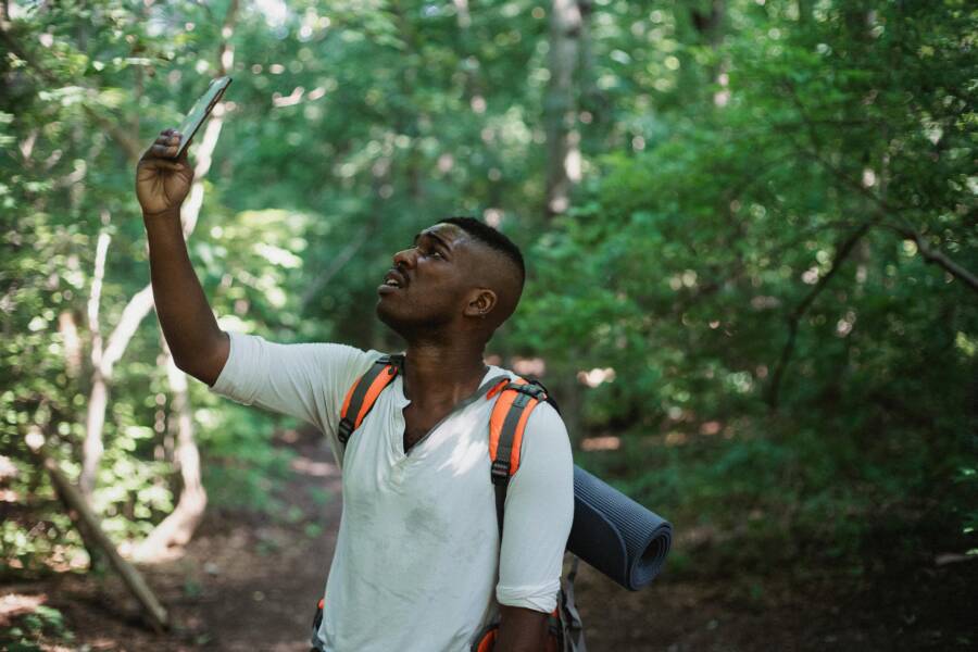 image of hiker with satellite connection