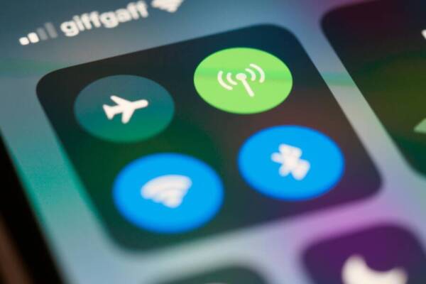 High-resolution close-up of smartphone interface showing control center icons