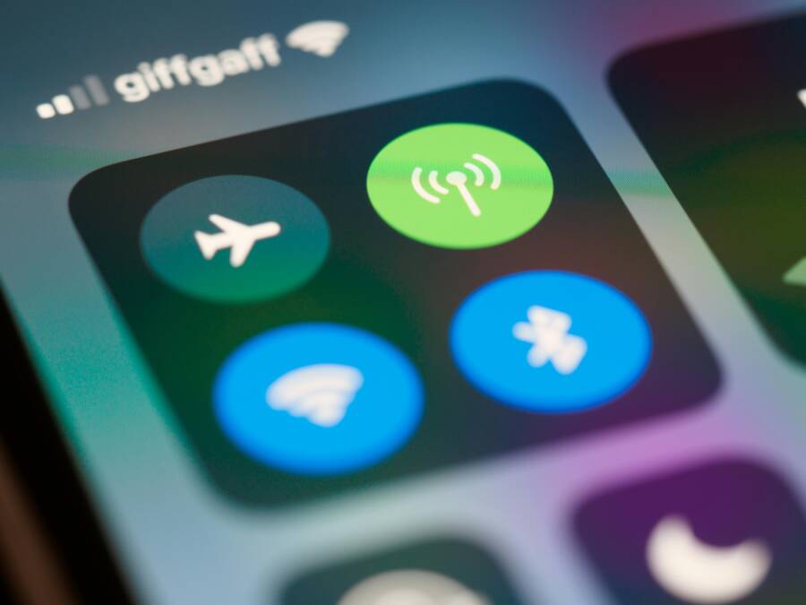 High-resolution close-up of smartphone interface showing control center icons