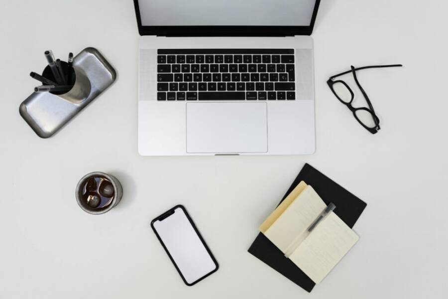 Top view of modern laptop and smartphone