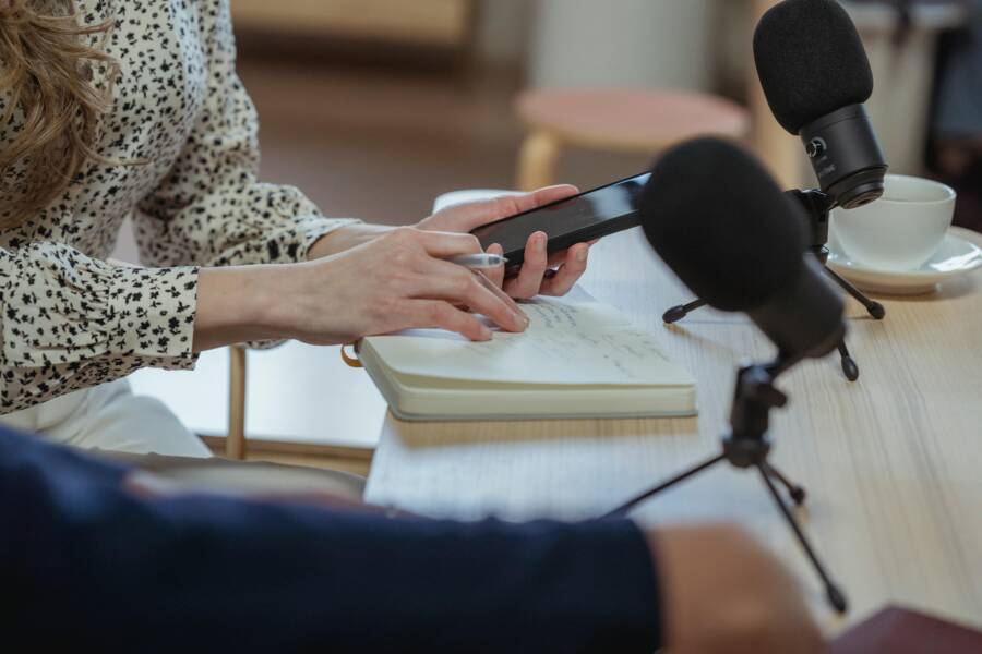 Photo of a smartphone-based recording setup in a studio environment
