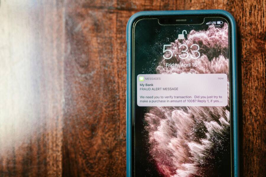 Test Notification Delays on Your Phone to Measure Push Latency (Android and iOS) Close-up of a smartphone displaying a notification on a desk